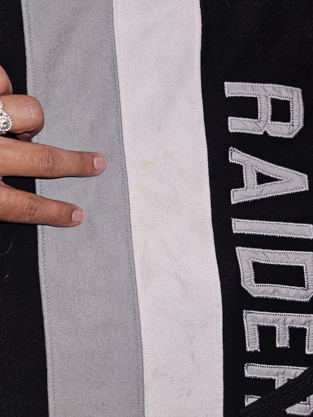 Las Vegas Raiders Black Pullover Hoodie with White & Gray Stripes